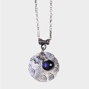 Sterling Silver Round Swirly Disc Pendant with Blue Gemstones
